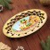Plate of an oval candy "Happy New Year 2025", gold