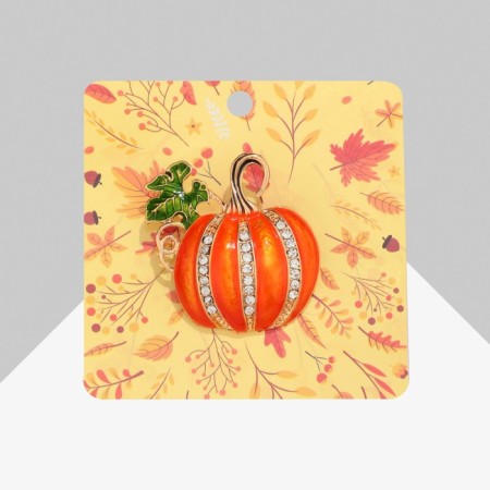 Brooch "Pumpkin" with a leaf, colored in gold