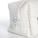 Cosmetic bag at the lightning textura, white color