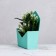Trapection envelope is monophonic, turquoise 19.5 x 23 x 8 cm