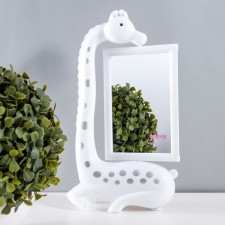A table lamp with a photo frame, a mirror 