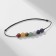 Bracelet of desires "7 chakras" on a black thread, the length is regulated