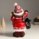 Ceramics Snowman "Snowman in a red fur coat, with a lantern and skiing" 21.5x12x31 cm