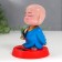 Plastic pendulum from the solar battery "Buddha with tars" 8x8x9 cm