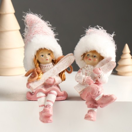 Souvenir Polystone "Baby/Baby in a pink suit, with skis" sits mix 5x6x14 cm