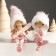 Souvenir Polystone "Baby/Baby in a pink suit, with skis" sits mix 5x6x14 cm