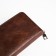 Male purse with lightning, department for bills, for cards, for coins, brown color
