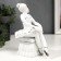 Souvenir Ceramics "Ballerina on the ottoman" White with silver 18x10x15.5 cm