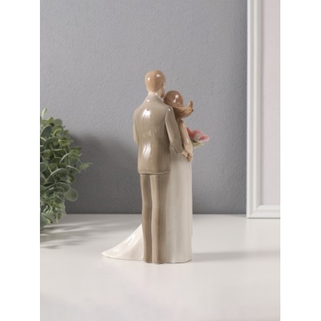 Souvenir Ceramics "The groom hugs the bride with the flower" 5x10.8x21 cm-2