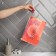 Cosmetic bag with zip-gl, transparent/orange color