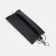 Key of zipper, length 13 cm, metal ring, black color