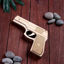 Souvenir wooden pistol is an elastic band, shoots with elastic bands