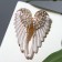 Angel wings brooch, rainbow-white color in gold