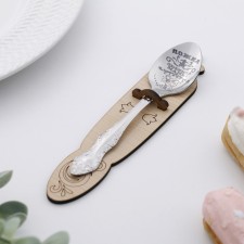 A teaspoon spoon with an engraving “beloved mother”, h = 14cm.
