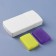 A tabletire with a divider, 2 sections, 9.5 × 5 × 1.5 cm, white/yellow/purple color