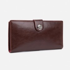 Male purse on a magnet, department for bills, for maps, for coins, brown color