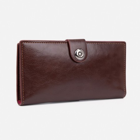 Male purse on a magnet, department for bills, for maps, for coins, brown color
