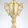 Cup 122C, award figure, gold, plastic stand, 34 × 13 × 9 cm.