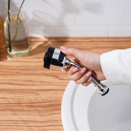 Nozzle on a crane to save water with variable pressure and angle-6
