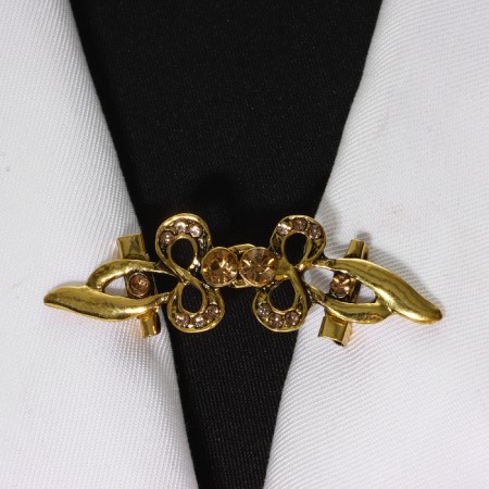 Cardigan clamp "Bant", the color of gold in black gold
