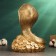 Piggy bank "Cobra on money" gold 25x18x20cm