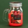 New Year's candle in a jar with a handle of "spice", cinnamon