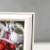 Photo frame 10x15 281g white with gold (plastic screen)