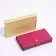 A set of decorative cosmetics: eye shadows, eyebrow shadows, lip gloss, blush, mirror