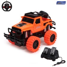 Radio controlled jeep Truck, pedal and steering wheel, works on the battery, color orange color