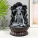 The desktop fountain from the network, Siva with a cobra sits under the trees 20.5x20.5x30 cm