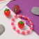 Set of children's "chosen" 3 subjects: clips, bracelet, ring, strawberries, colored