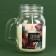 New Year's candle in a bank with a pen "Sweetness", chocolate