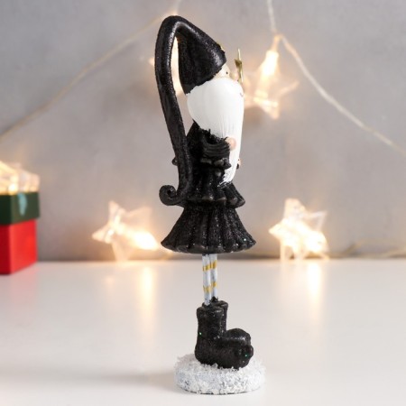 Polystone souvenir "High Santa Claus in black caftan, with a star" Long legs 15x5x4 cm-1