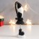 Polystone souvenir "High Santa Claus in black caftan, with a star" Long legs 15x5x4 cm
