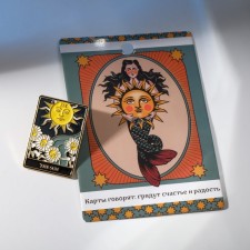 The “Tarot” icon sun, colored in gold