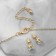 Set 2 objects: earrings, pendant "Heart" with a flower inside, colored in gold, 40 cm