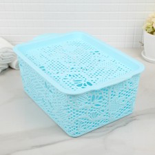 The container is plastic for storage with the lid 