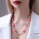 Beads with pearls "Galance" ball No. 6.12, white-pink color in gold, l = 80 cm