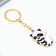 Key keychain for children, metal "raccoon", 2.8 x 4.3 cm