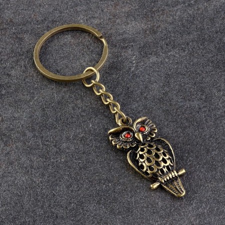 Souvenir-sides "owl bold", brass, amber, 5x1.5x8.5 cm