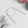 The knitting needles are circular, for knitting, with a metal cable, d = 3 mm, 60 cm