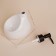 A soap dispenser with a Savanna drop sponge stand, 450 ml, white color