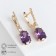 Earrings with rhinestones "blitz", white-purple color in gold