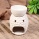 Aroma lamp ceramics "Buddha with a bowl on the head" mix 11.5x8x9 cm