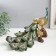 Polystone souvenir "Peacock with green gray feathers, Sapphire on the snag" 32x14x20.5 cm