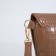 Bag-clath on magnet, strap on the wrist, brown color