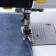 Feet for sewing machines, for processing the edge