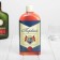 Box tin in the shape of a bottle for strong alcohol "First"