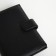 Male purse on the button, department for auto documents, black color