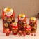 The nesting doll "Golden flowers", a red dress, 10 puppet. 26 cm
